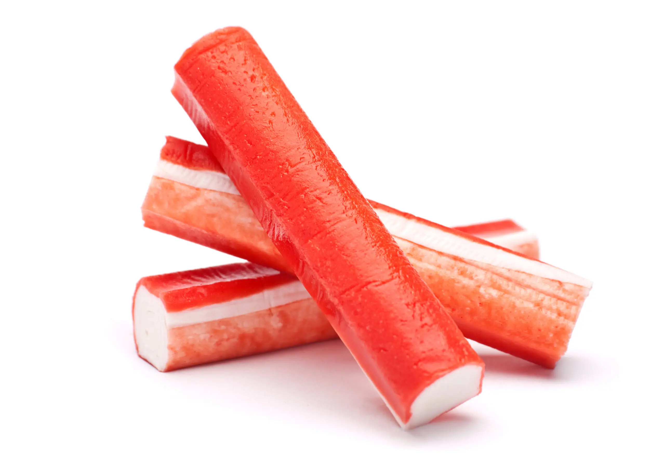 Surimi crab stick closeup isolated on white background